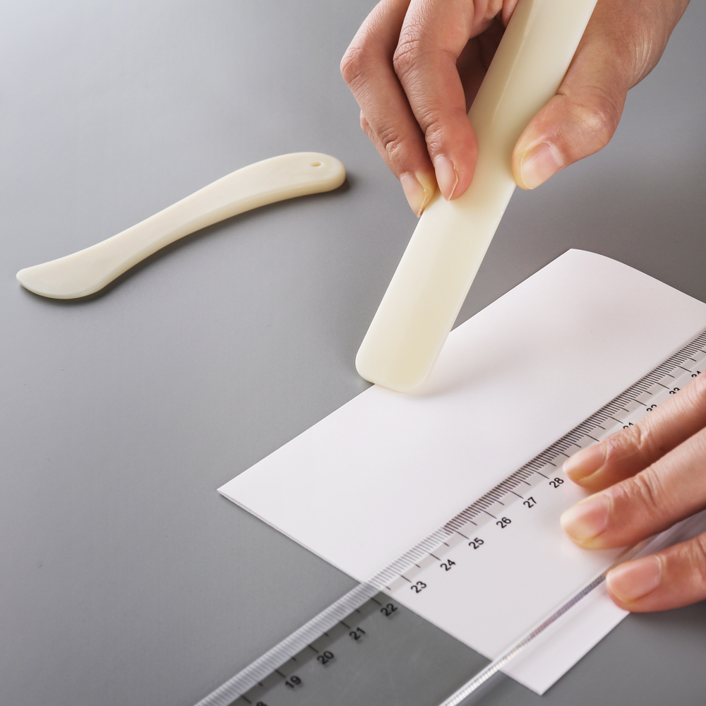 Creaser de papel y carpeta de  - Bone Folder Tool reseña y precio